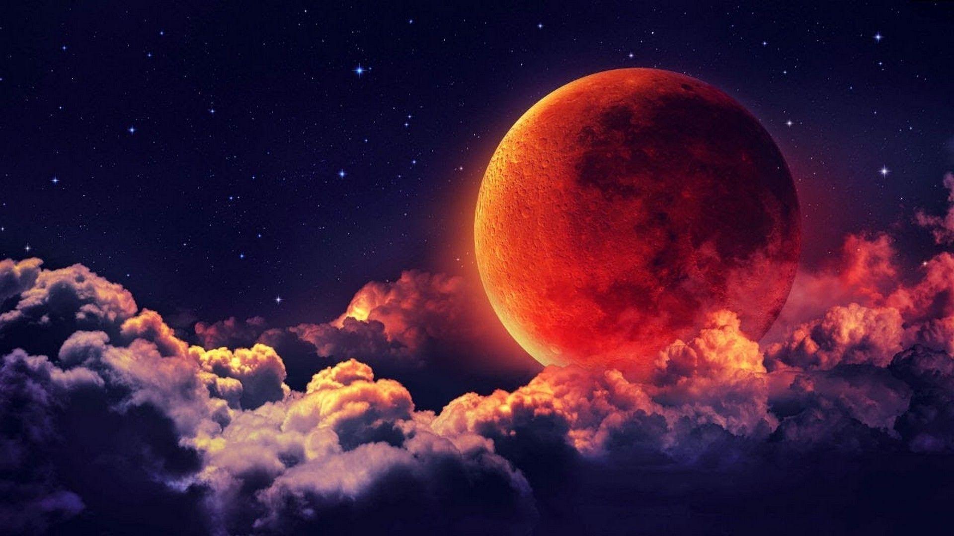 A red moon amoung the clouds.